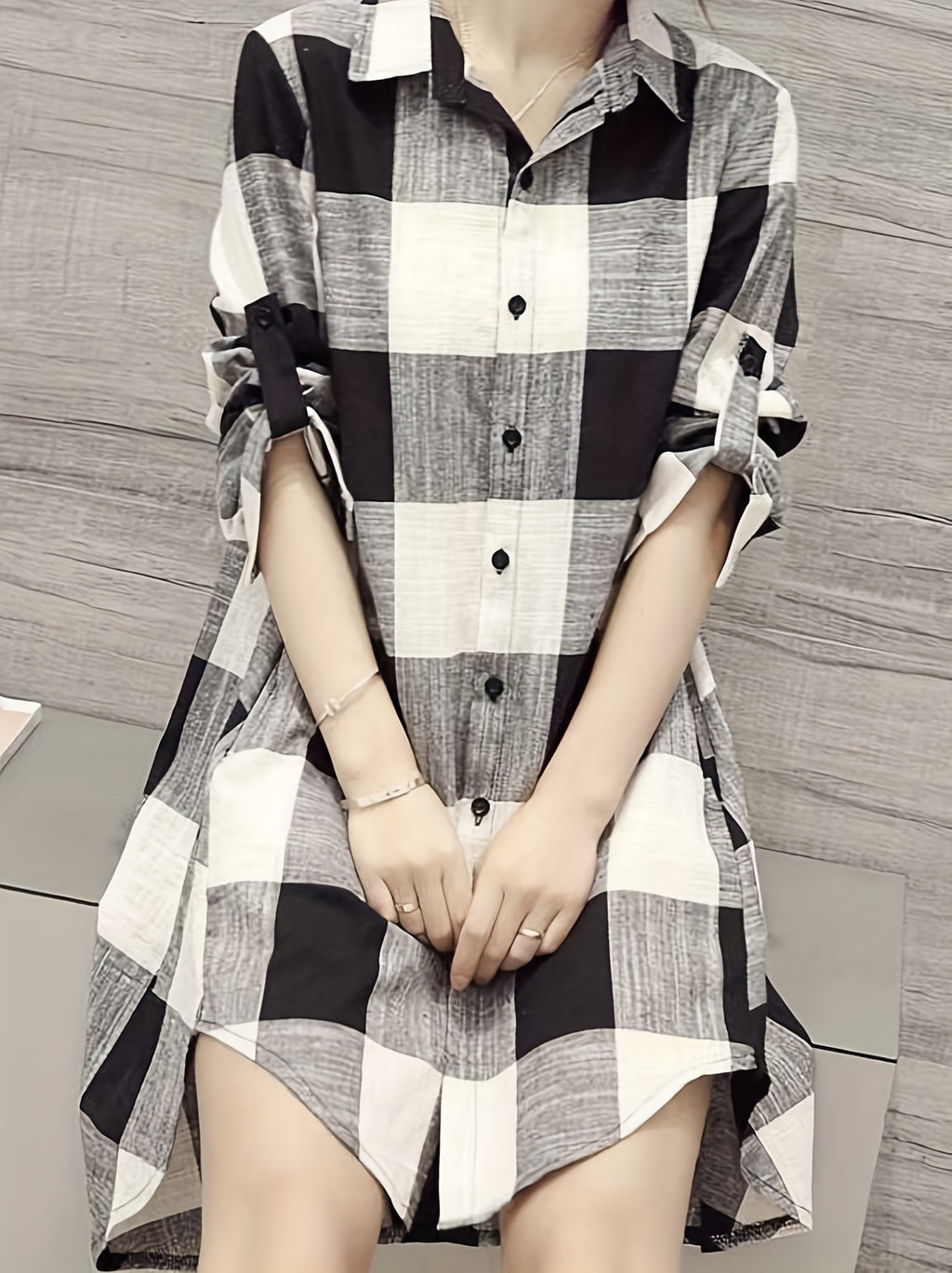 Camisa alongada xadrez com botões