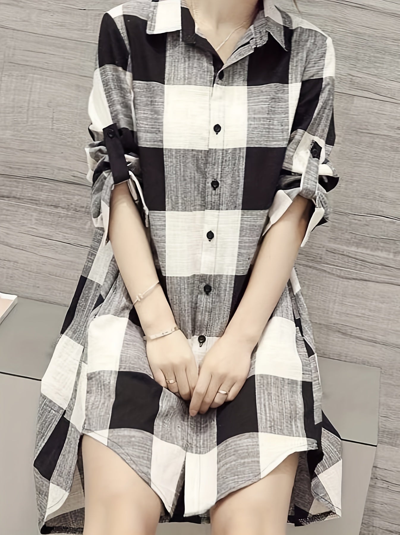 Camisa alongada xadrez com botões