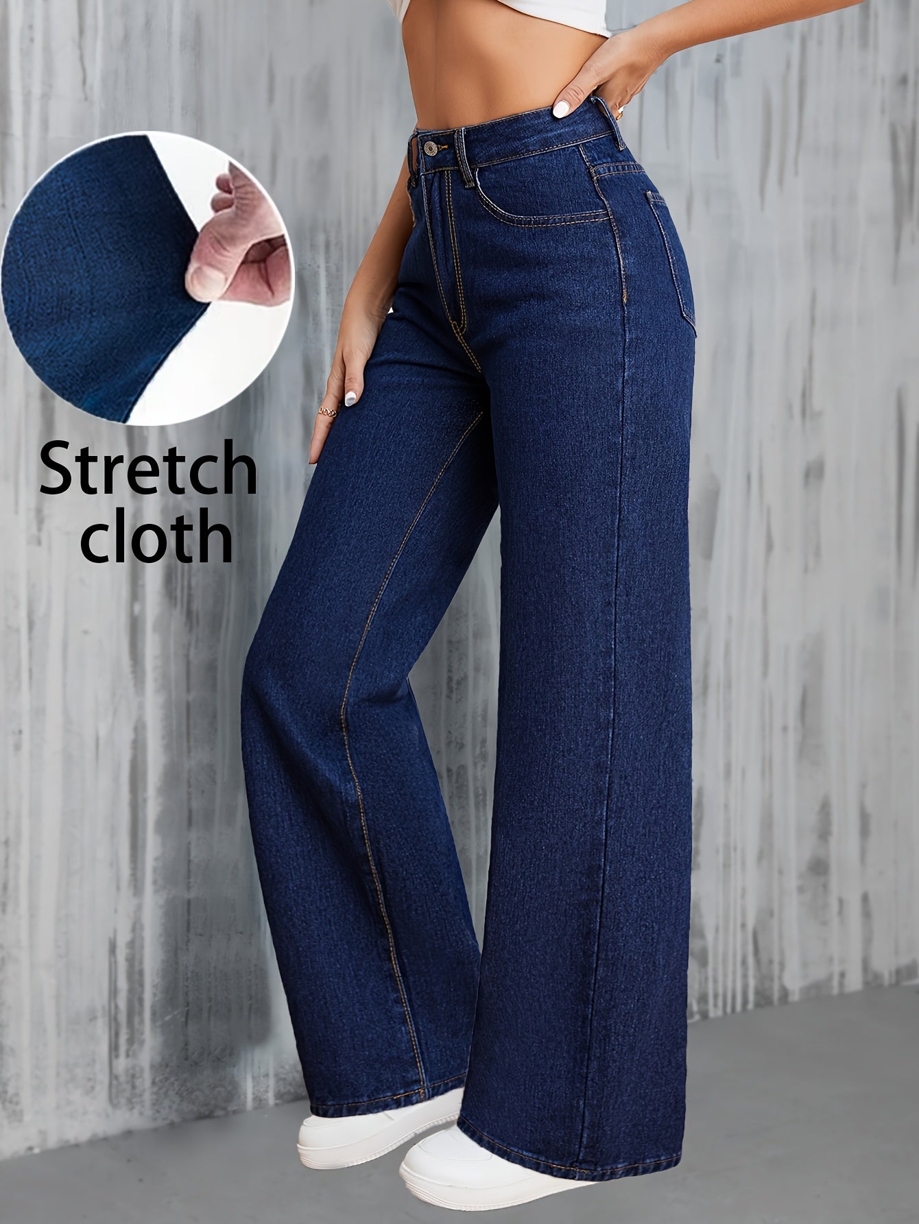 Calça jeans de lavagem escura e lisa com cintura alta e corte reto