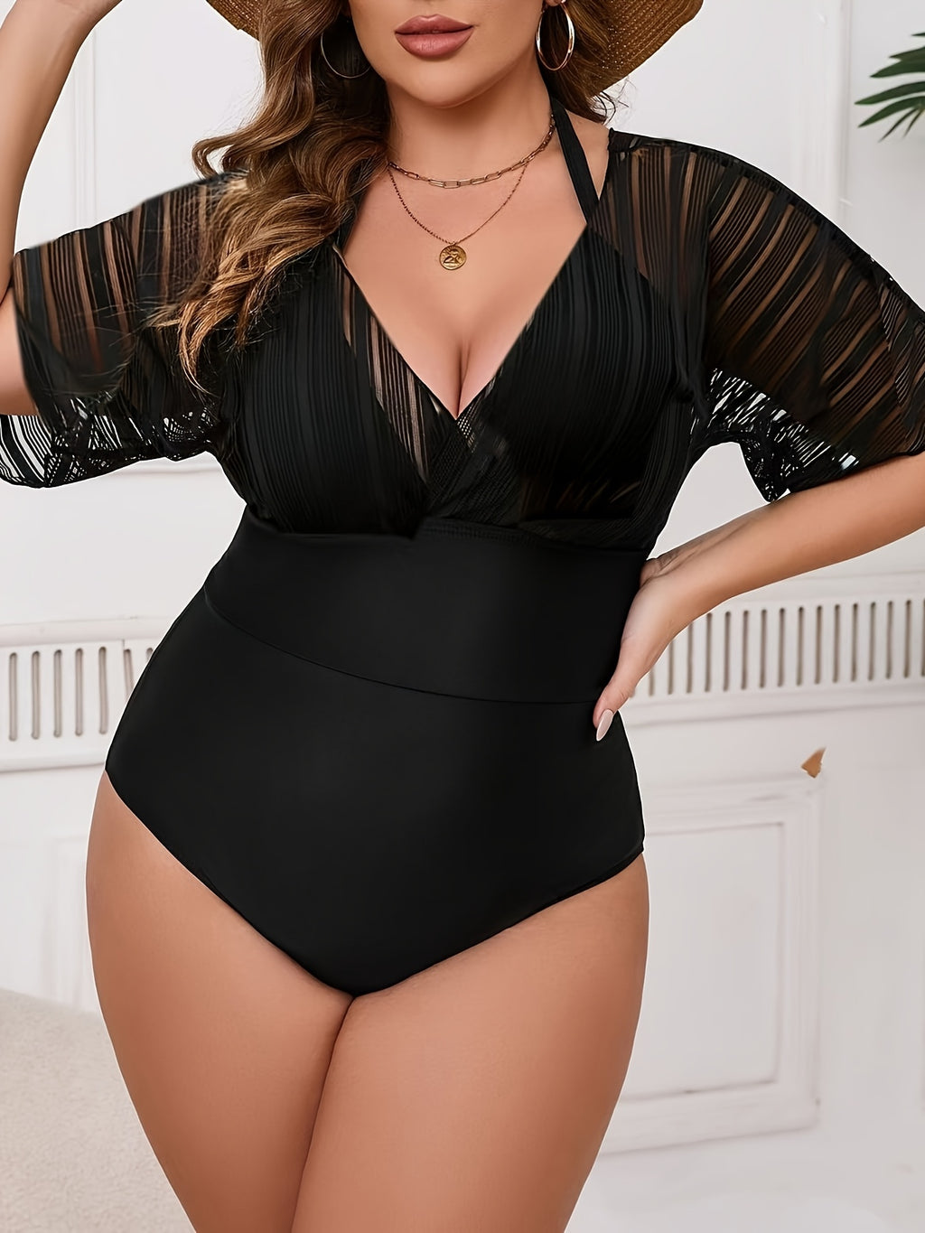 Maiô plus size com mangas curtas detalhadas