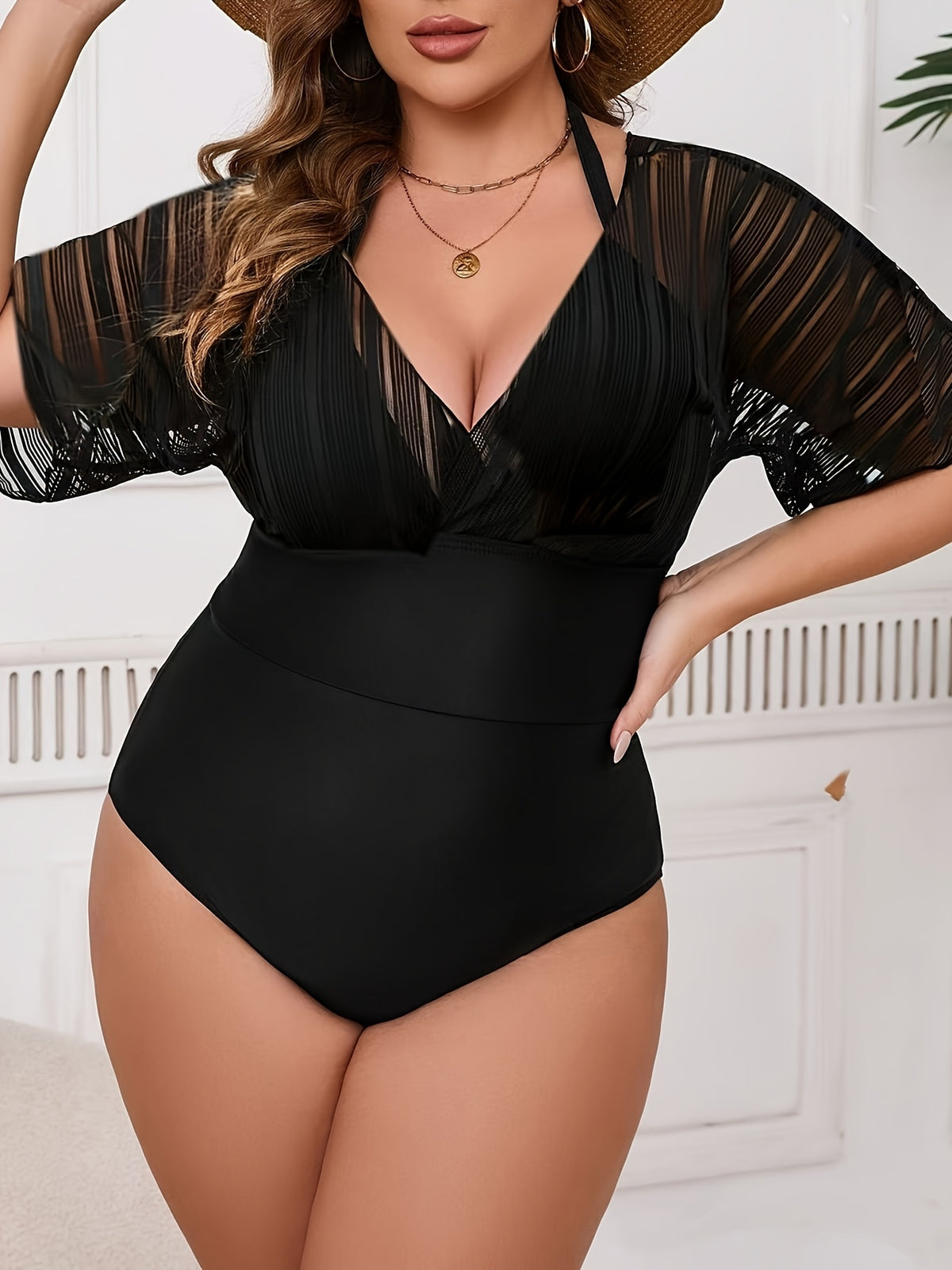 Maiô plus size com mangas curtas detalhadas