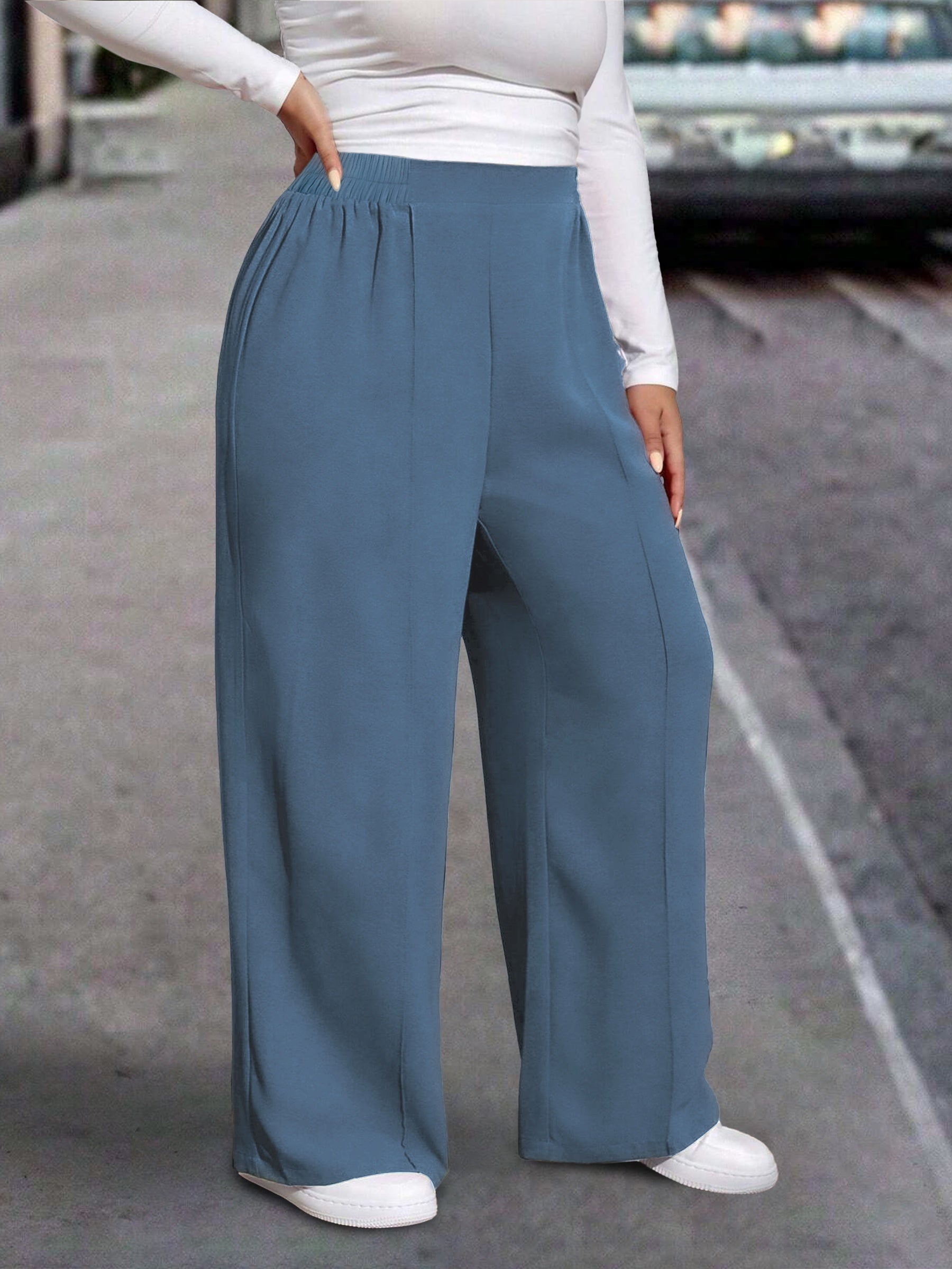 Calça pantalona com cintura elástica