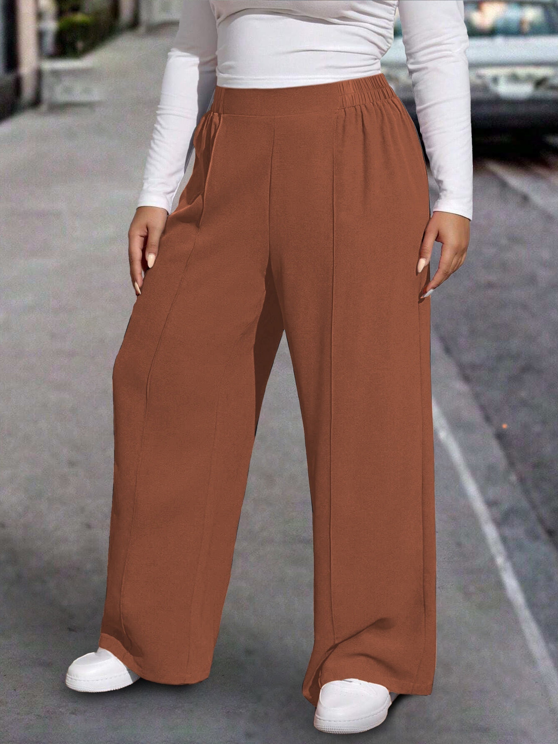 Calça pantalona com cintura elástica