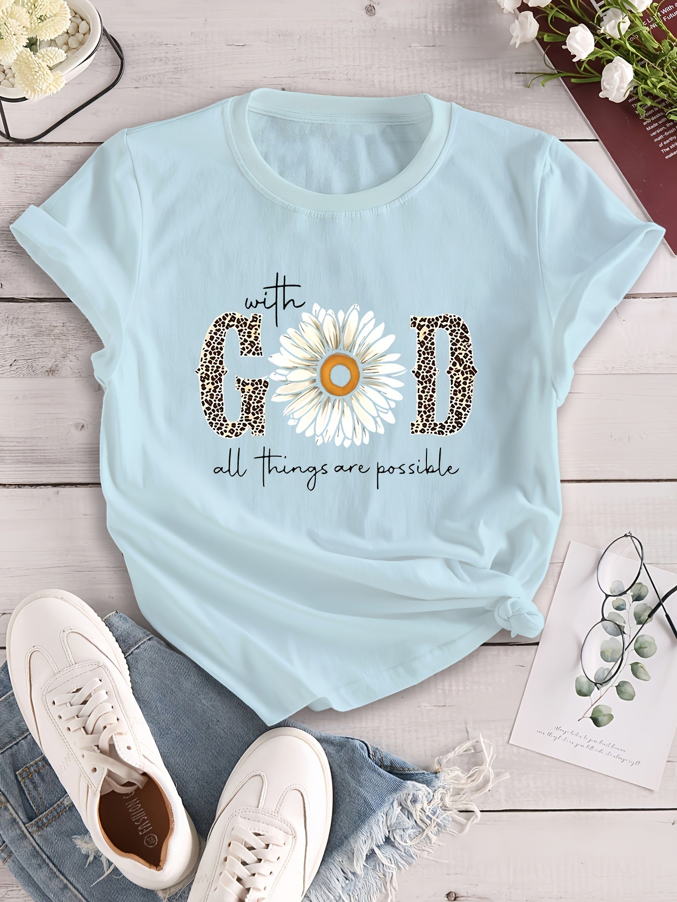 Camiseta estampada "com Deus tudo é possível"