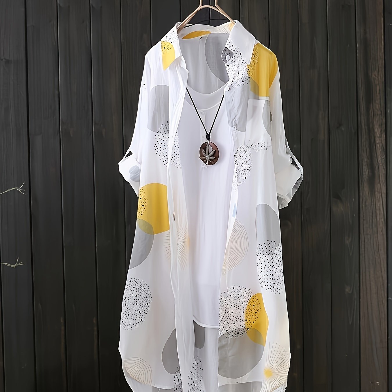 Camisa alongada com estampa geométrica