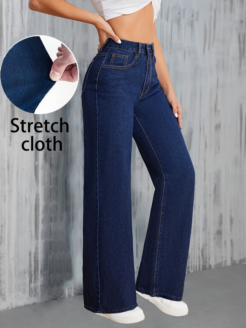 Calça jeans de lavagem escura e lisa com cintura alta e corte reto