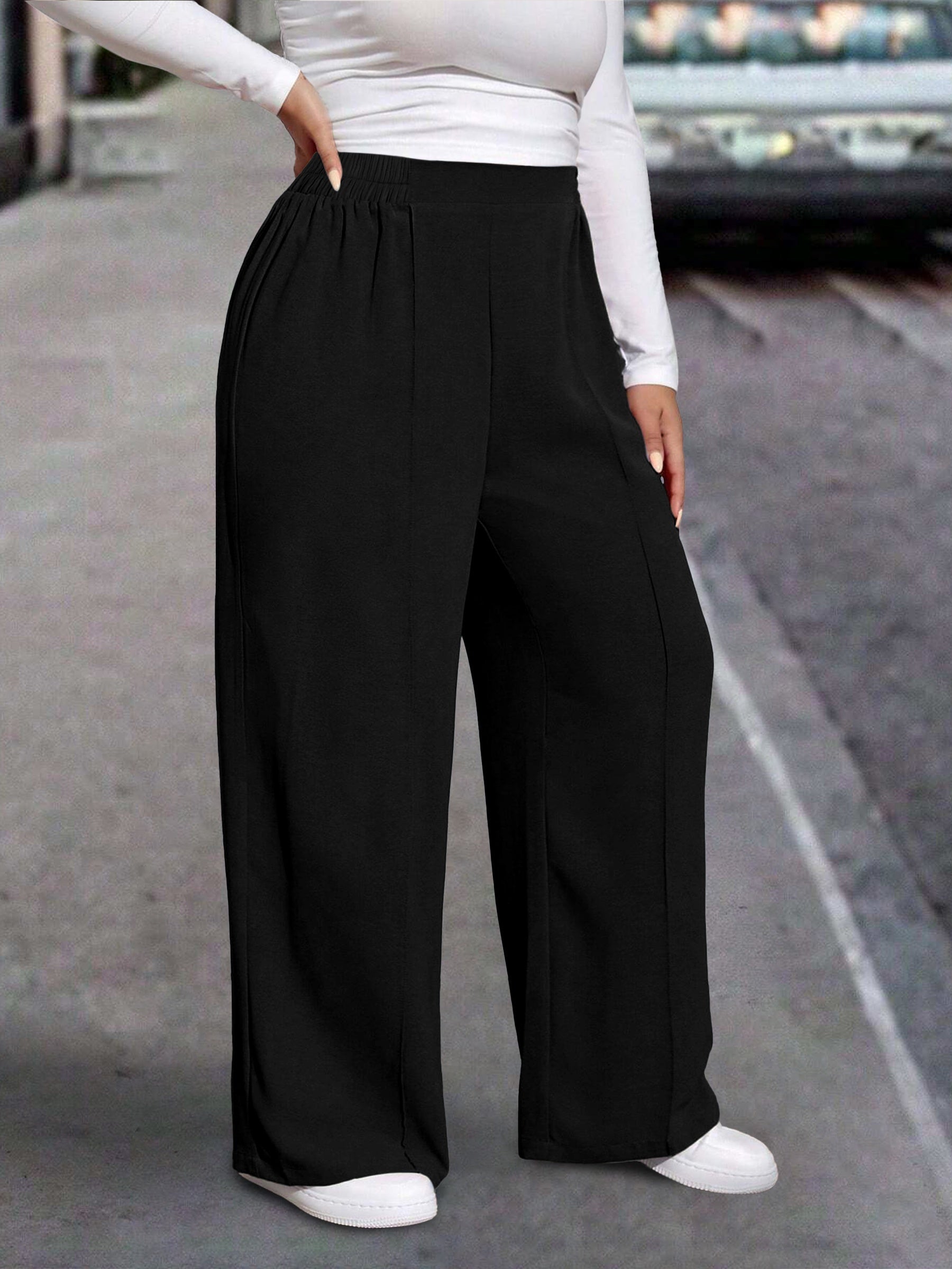 Calça pantalona com cintura elástica